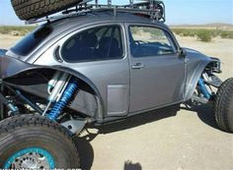A dune buggy with better suspension is able to travel across the sand faster. . Long travel vw front suspension